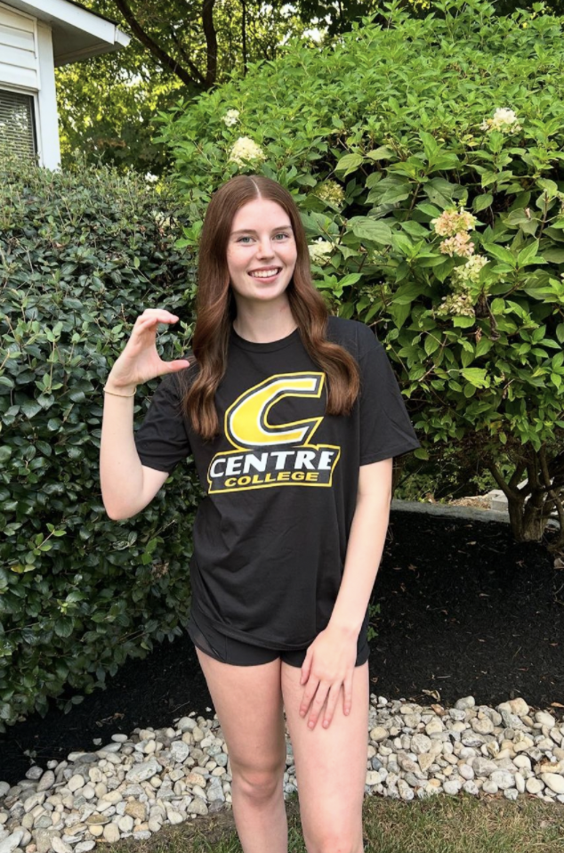 Ella Cox (12) poses for a photo with Centre College gear on to represent her recruitment. (Photo from Ella Cox). 
